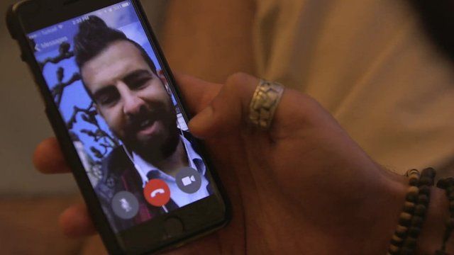 Joseph, a gay Syrian, is on the phone with his boyfriend in Istanbul