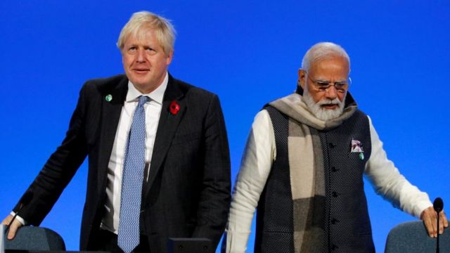 رئيس الوزراء البريطاني بوريس جونسون (إلى اليسار) ورئيس الوزراء الهندي ناريندرا مودي
