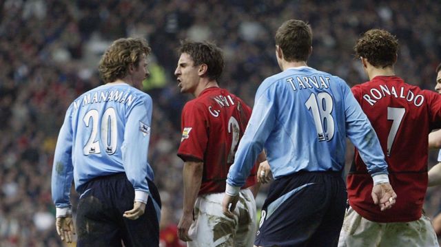 Steve McManaman and Gary Neville square up in FA Cup fifth round 2004