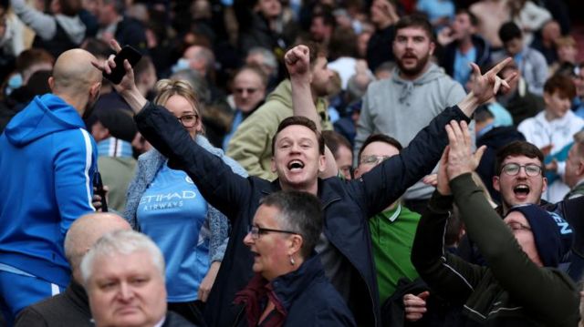 Manchester City supporters celebrate