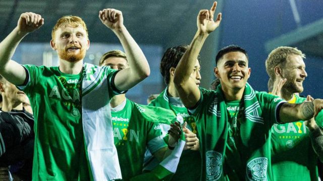 Celtic's Liam Scales and Luis Palma celebrate at full time after winning the 2023/24 Premiership title during a cinch Premiership match between Kilmarnock and Celtic at Rugby Park, on May 15, 2024, in Kilmarnock, Scotland
