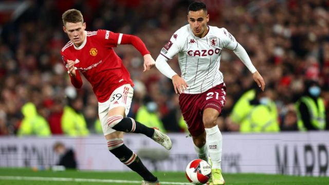 Anwar El Ghazi battles for the ball with Manchester United's Scott McTominay