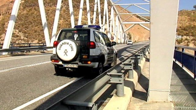 Police vehicle on the bridge