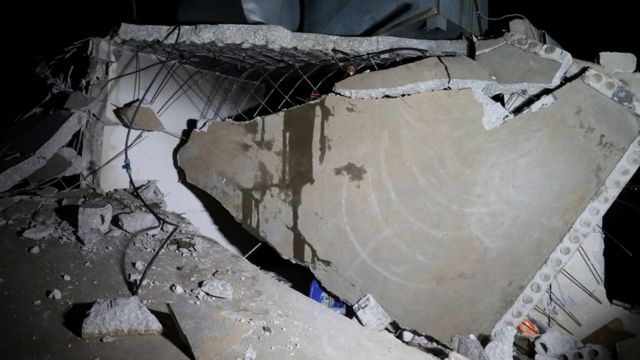 Atme, Suriye'de hasar gören bir bina, 3 Şubat 2022.