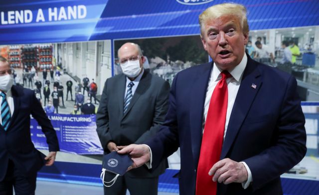 Donald Trump tours a Ford car factory that has switched to making ventilators