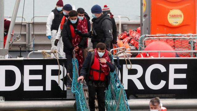 Migrants located in the Channel leaving a Border Force boat