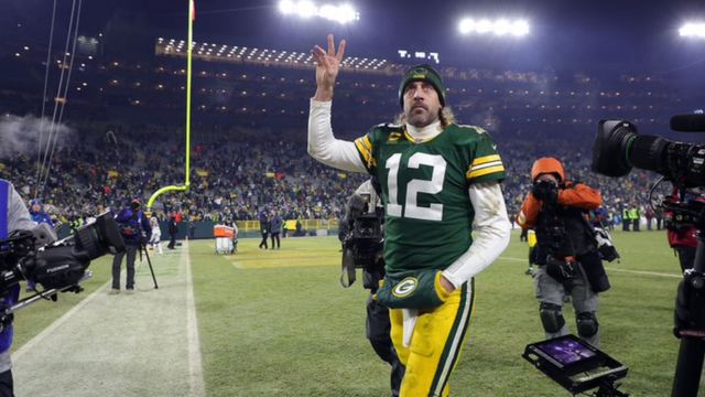 Aaron Rodgers walking off the pitch
