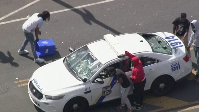 An attack on a police car in West Philadelphia on Sunday