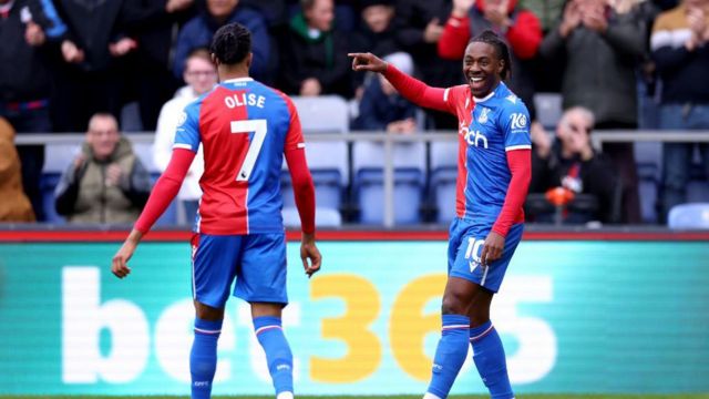 Eberechi Eze of Crystal Palace celebrates scoring his team's second goal with teammate Michael Olise during the Premier League match between Crystal Palace and West Ham United at Selhurst Park