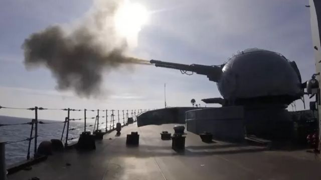 A cannon aboard the Moscow guided-missile cruiser.