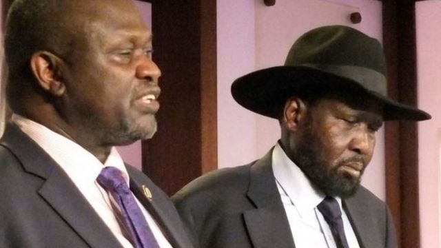 Riek Machar 9i bubamfu) na prezida Salva Kiir (i Buryo)
