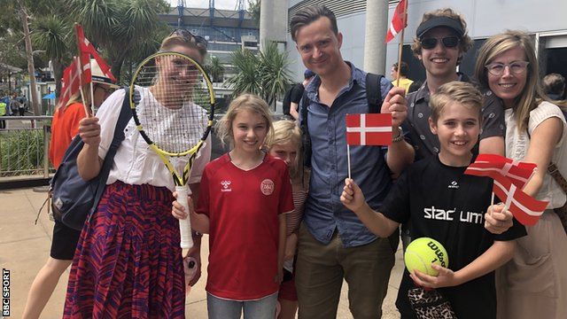 Sigred Oestergaard (holding the prized racquet) watched Wozniacki's final match with her dad Jakob, mum Lisbeth, sister Marie and their family friends Julie, Harry and Frederik,