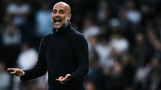 Pep Guardiola shouts from the touchline