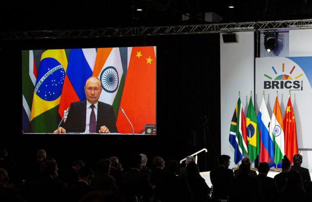 Le président russe Vladimir Poutine s'est adressé au sommet par liaison vidéo