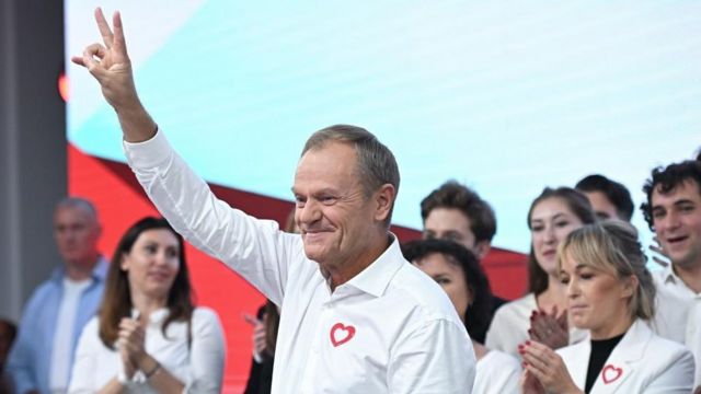 Civic Platform (PO)leader Donald Tusk (C) reacts during Law and Justice party parliamentary elections night in Warsaw, Poland, 15 October 2023.