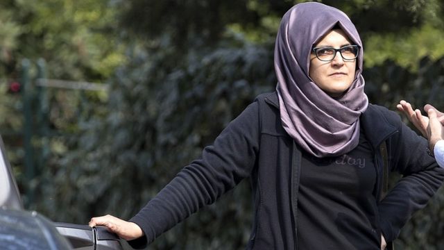 Jamal Khashoggi's fiance Hatice Cengiz waits in front of the Saudi Arabian consulate in Istanbul
