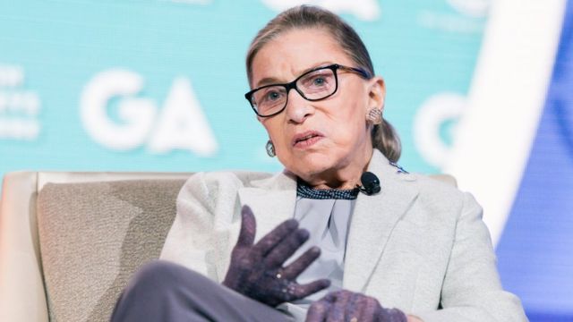 Ruth Bader Ginsburg in her trademark lace gloves