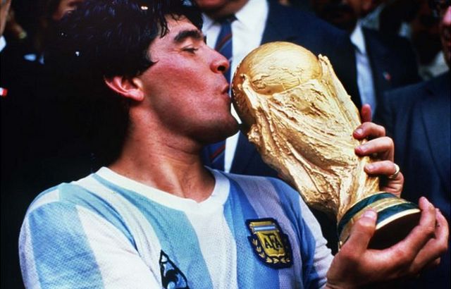 Diego Maradona with the World Cup