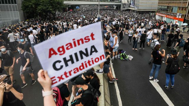 Sign in Hong Kong protest saying "against China extradition"