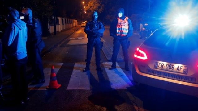 French police at the scene of the attack in the Paris suburb of Conflans-Sainte-Honorine, France. Photo: 16 October 2020.