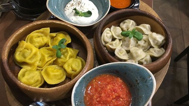 The filling of a Russian dumpling (or pelmeni) can tell you where it's from: the yellow ones are stuffed with carrots, duck and goose, are from the Urals. The white ones are made with pork, beef, and mutton, are from Siberia.
