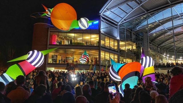 French troubadours Picto Facto bring the Love Light festival parade to Norwich's Forum building