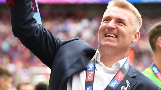 Dean Smith celebrates Aston Villa's promotion to the Premier League in 2019
