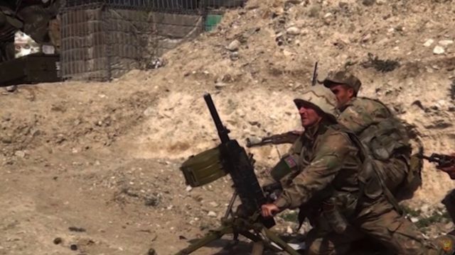 Two regular Azerbaijani in a firing position