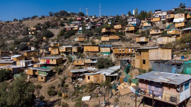 View of the Toma la Cancha camp on a hillside in the Lo Barnechea commune in Santiago.