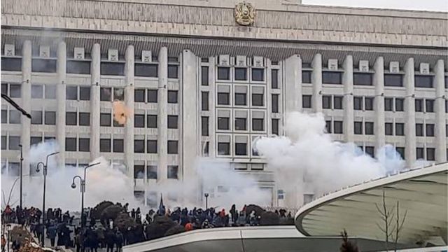 Large numbers of protesters gather in front of the building that houses the mayor's office in Almaty, Kazakhstan.