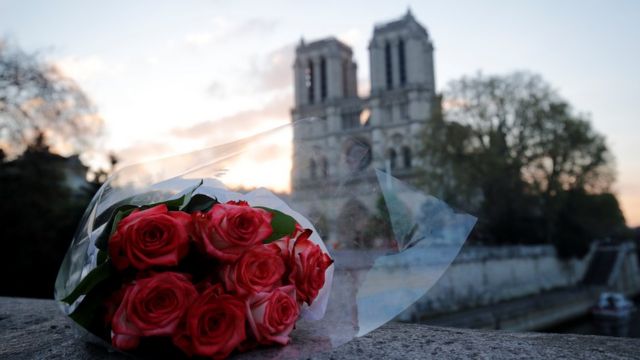 Flowers laid outside Notre-Dame cathedral in Paris, April 2019