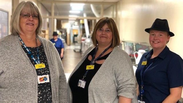 Trish Purfit, Kate Teece and Katie Bray in their corridor kitchen