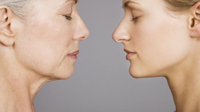 Two women in profile with their eyes closed