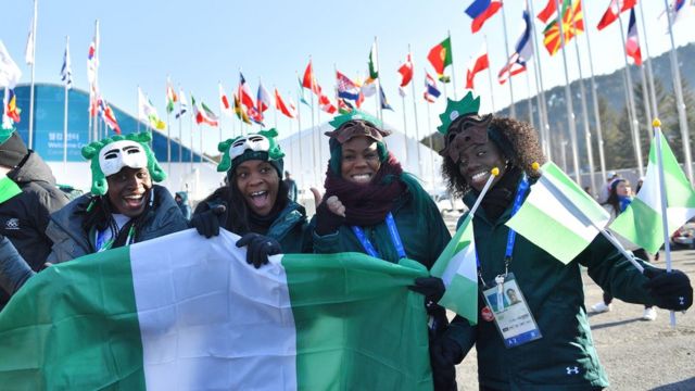 Nigeria's women's bobsleigh and skeleton team members Seun Adigun, Ngozi Onwumere, Akuoma Omeoga and Simidele Adeagbo attend a welcoming ceremony for the team in the Olympic Village in Pyeongchang