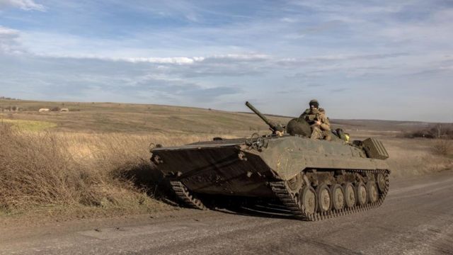 Ukrainian servicemen in a tank near the frontline town of Bakhmut, in Ukraine's Donetsk region