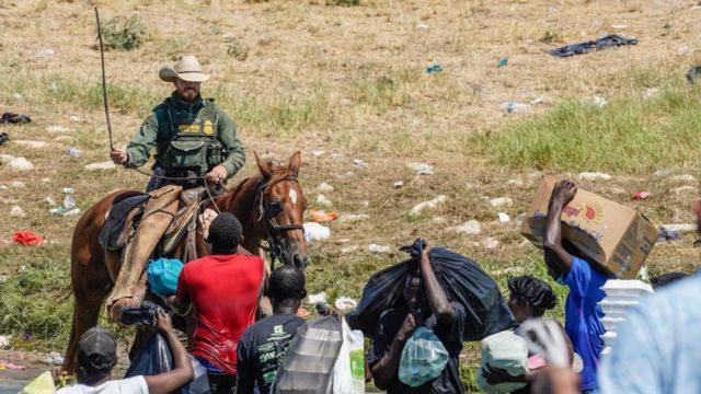 Border agent on horseback swinging a long rein