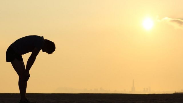 Silhouette d'un coureur fatigué.