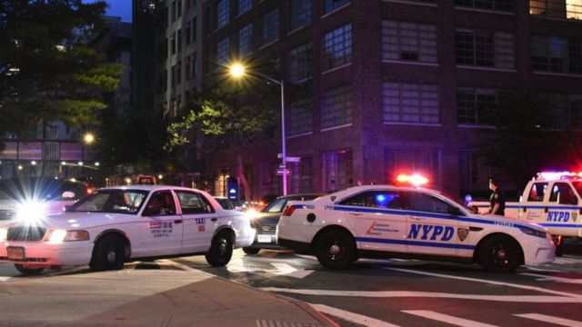 Police cars block a street during a protest in New York sparked by the death of George Floyd, 2 June 2020
