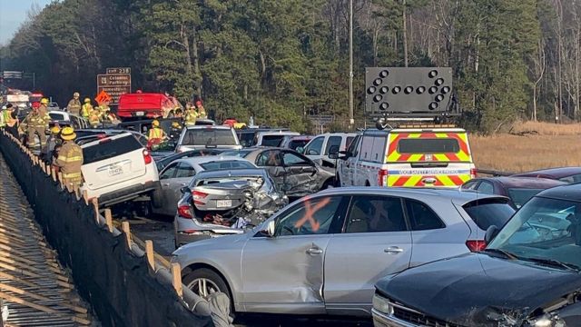 Damaged vehicles are seen after a crash on I-64 in York County, Virginia, December 22, 2019