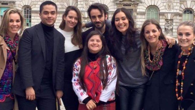 Isabella with other designers, posing in group at Somerset House, London