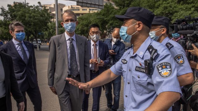 Police outside Yang Hengjun's court trial in Beijing stop Australian diplomats from entering