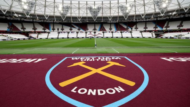 West Ham badge and pitch general view