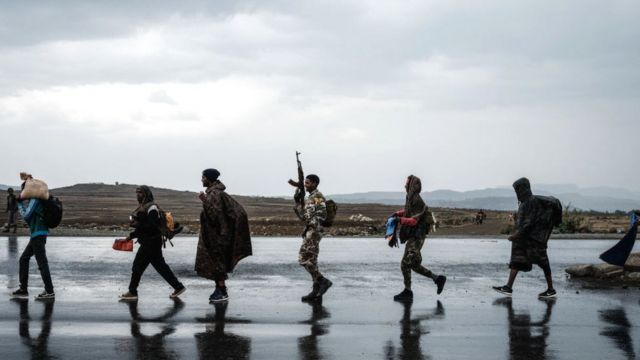 Soldiers of Tigray Defence Force (TDF) walk in lines towards another field in Mekele, the capital of Tigray region, Ethiopia, on June 30, 2021.
