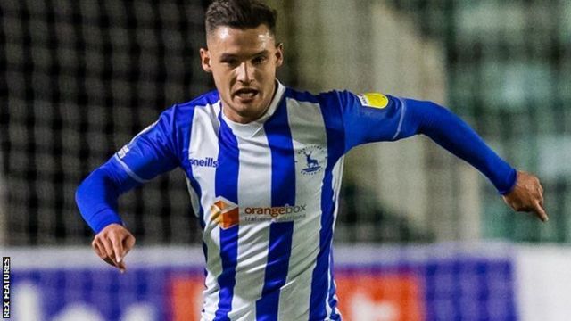 Hartlepool United's Luke Molyneux in action with Altrincham's Andy News  Photo - Getty Images