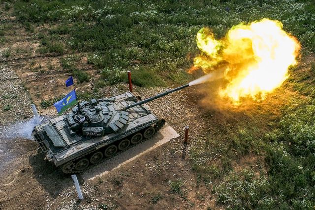 A tank opens fire