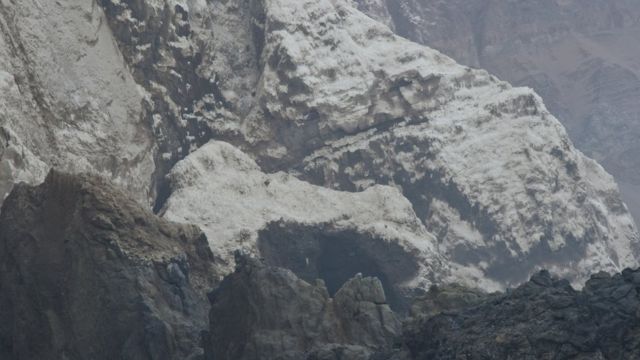 Sea cliffs in Chile covered in guano.