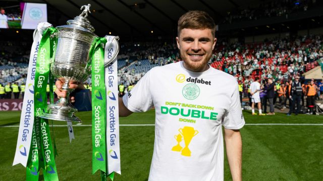 Celtic's James Forrest with the trophy at full time during a Scottish Gas Scottish Cup final match between Celtic and Rangers at Hampden Park