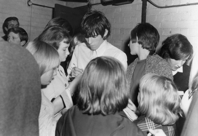 Keith Richards signing autographs at Ipswich Gaumont, 1964