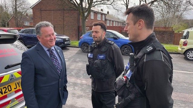 PCC David Lloyd talking to community police officers 