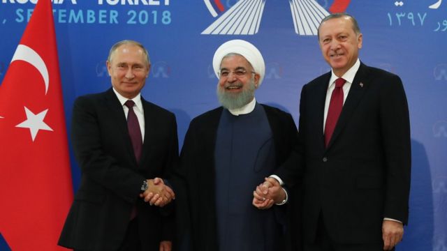 رجب طيب أردوغان وحسن روحاني وفلاديمير بوتين